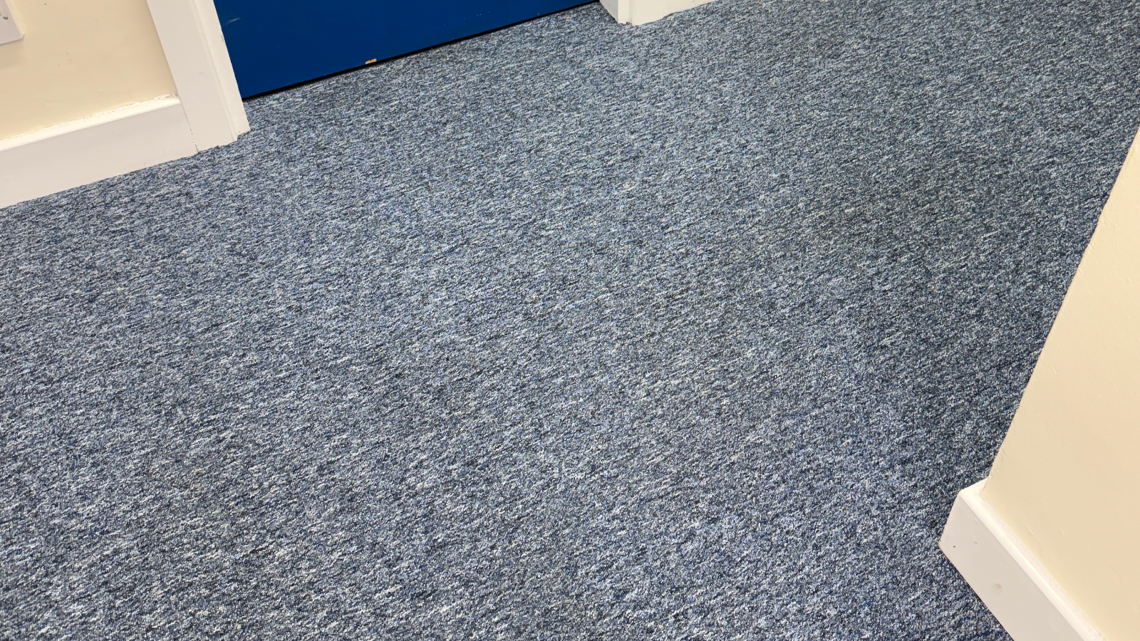 Commercial carpet restored after specialist low-moisture cleaning removed traffic lane soiling and oily contamination