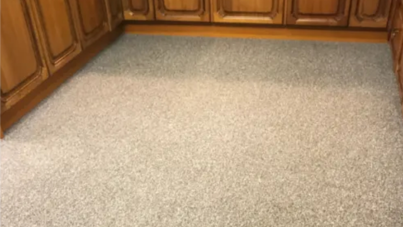 Carpet tiles in Washington after low-moisture deep cleaning restored a cleaner and more even appearance