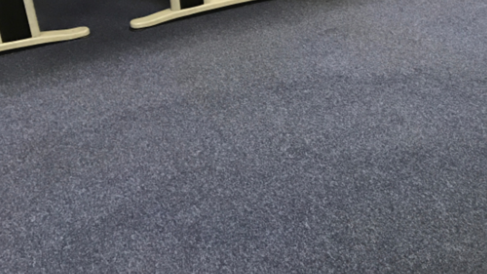Supervisor office carpet tiles restored to a cleaner brighter appearance after commercial cleaning