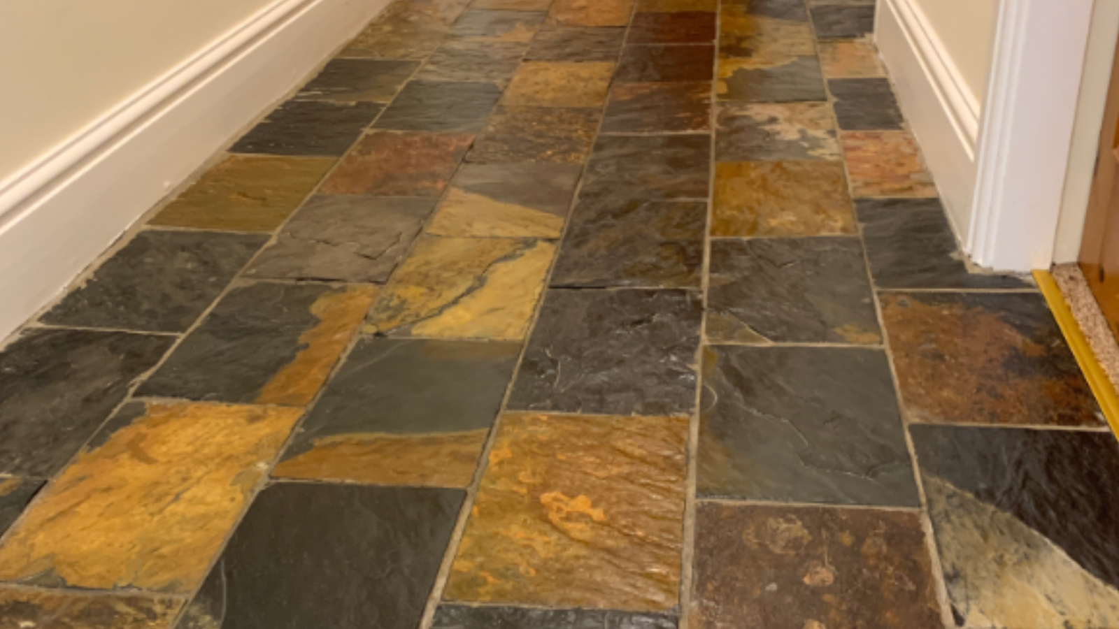 African slate hallway floor in Newcastle after professional restoration and colour-enhancing sealing