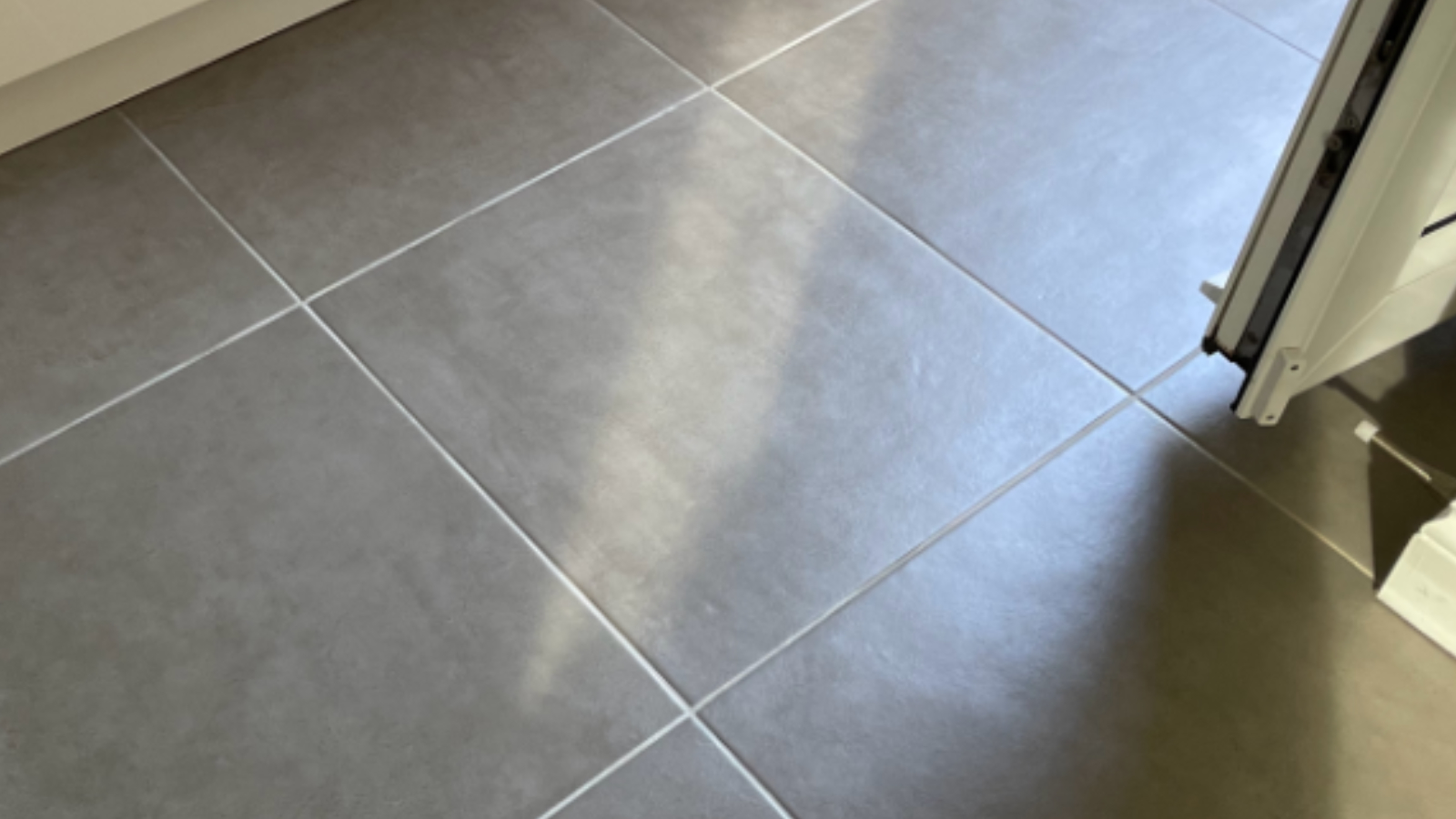 Ceramic kitchen floor tiles in Houghton-le-Spring after professional tile and grout cleaning restored a cleaner appearance
