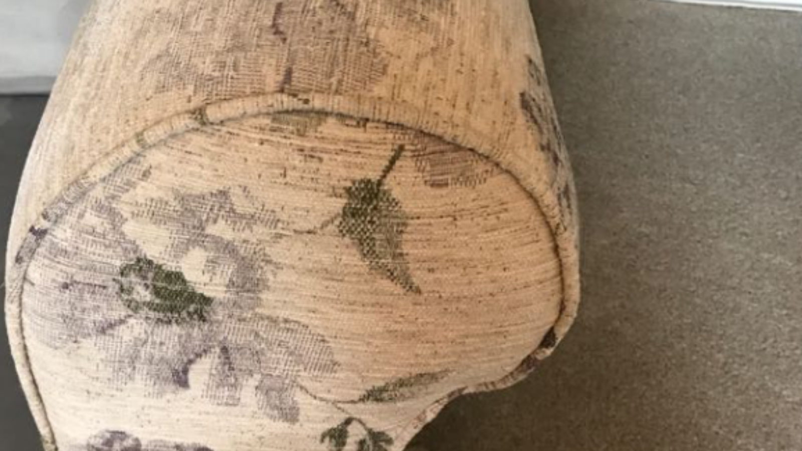 Fabric sofa arm restored after degreasing and low-moisture upholstery cleaning