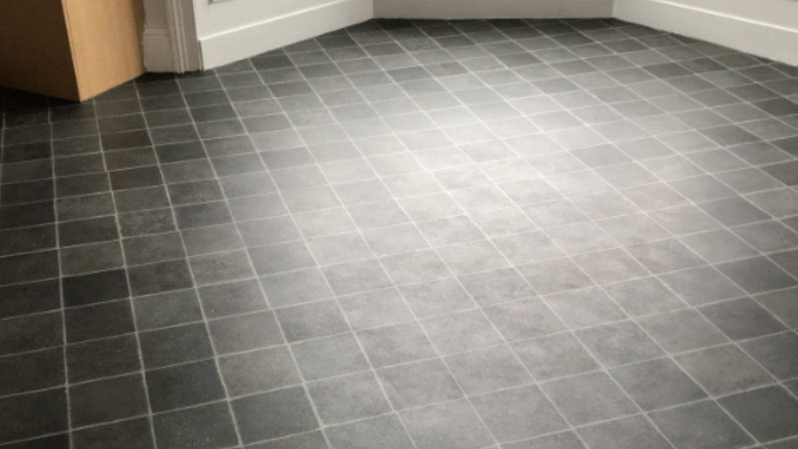 Vinyl kitchen floor in Sunderland after builders clean contamination was removed and the original appearance restored