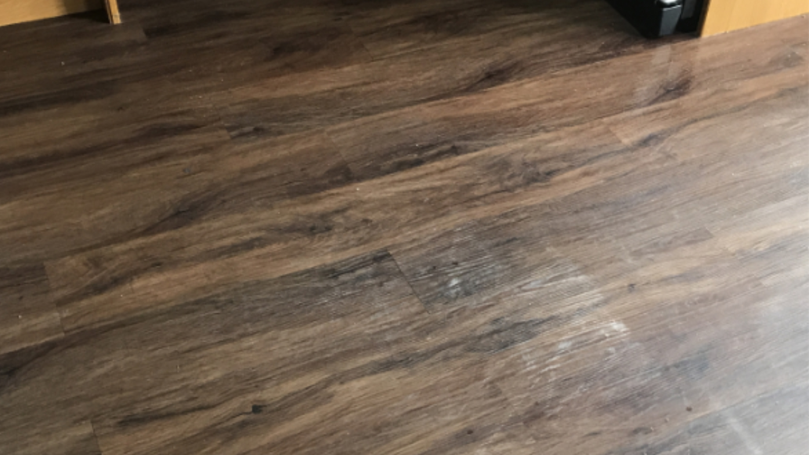 Karndean LVT floor in County Durham before stripping, cleaning and re-polishing