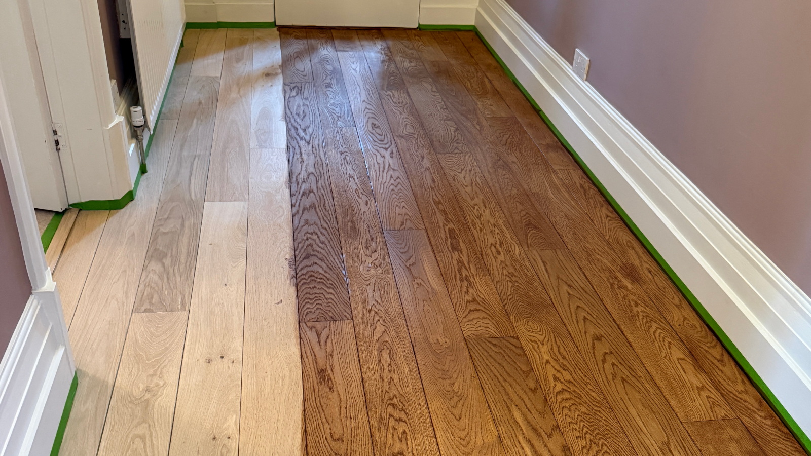 Engineered oak floor during stain colour testing before final finishing