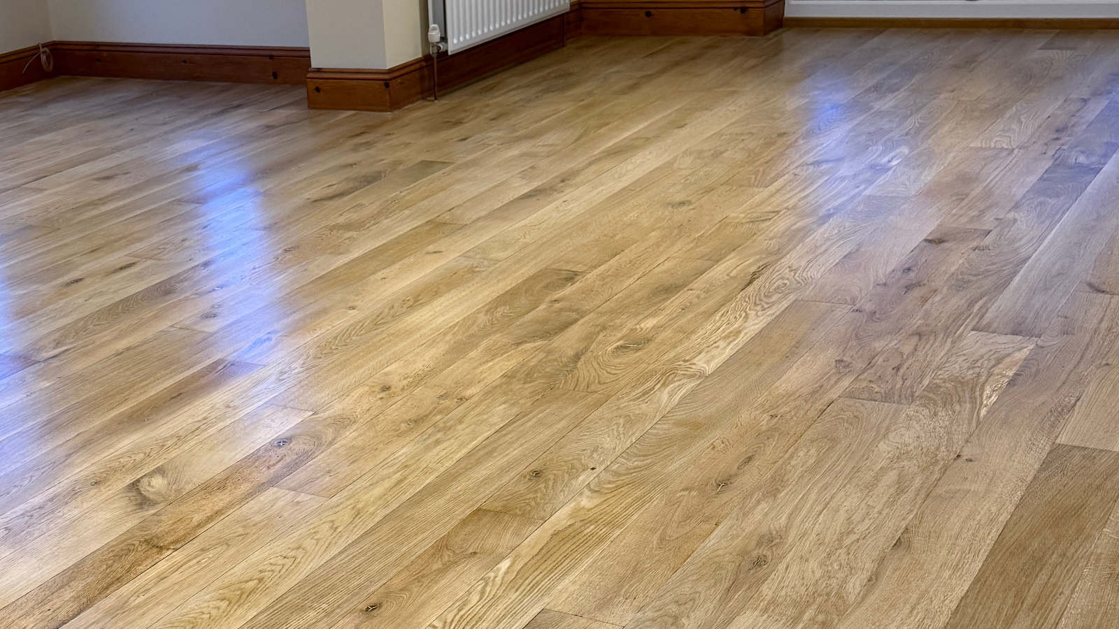 Restored solid oak flooring finished with Bona Mega EVO Silk Matt
