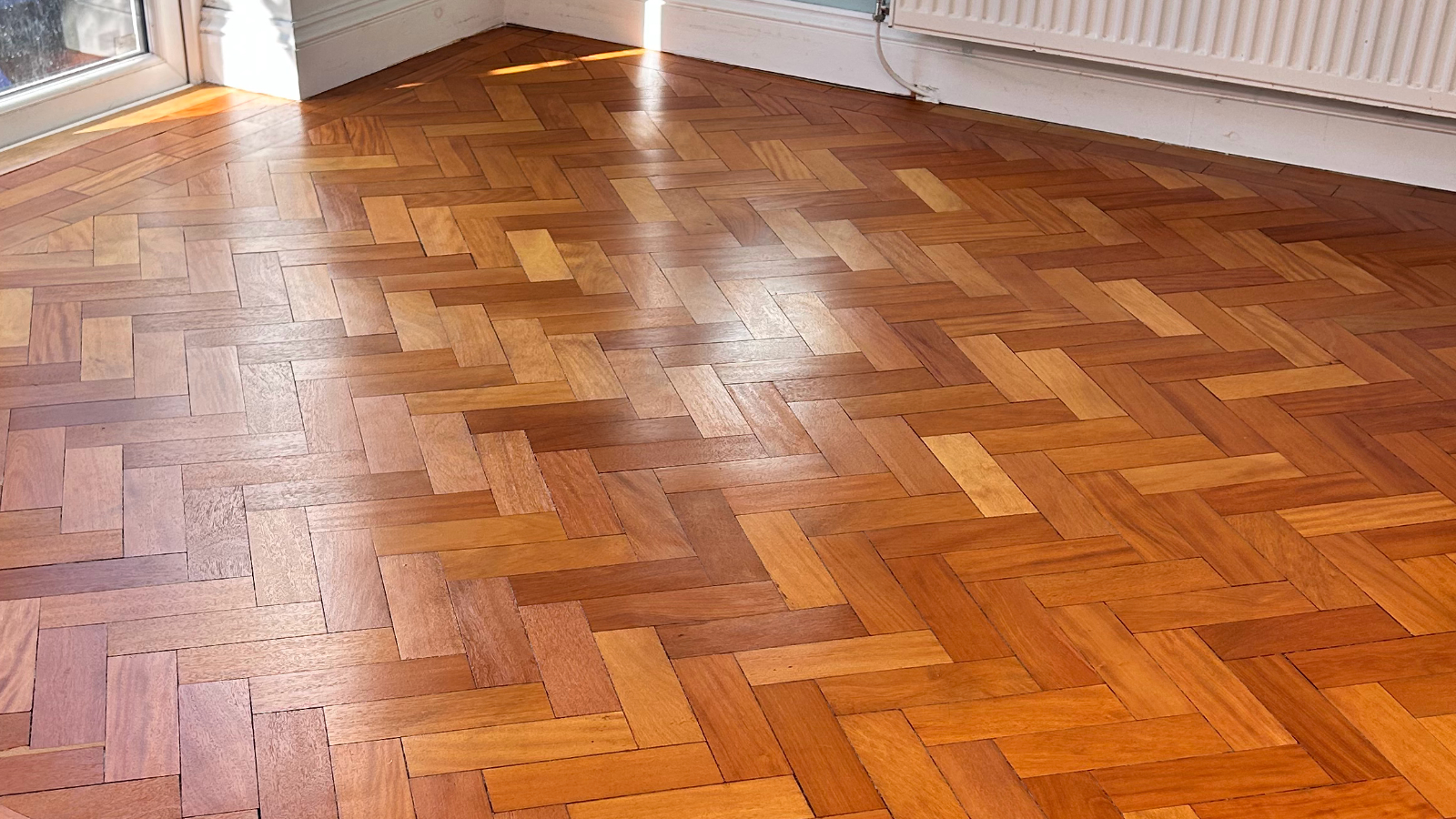 Restored parquet floor after sanding and resealing
