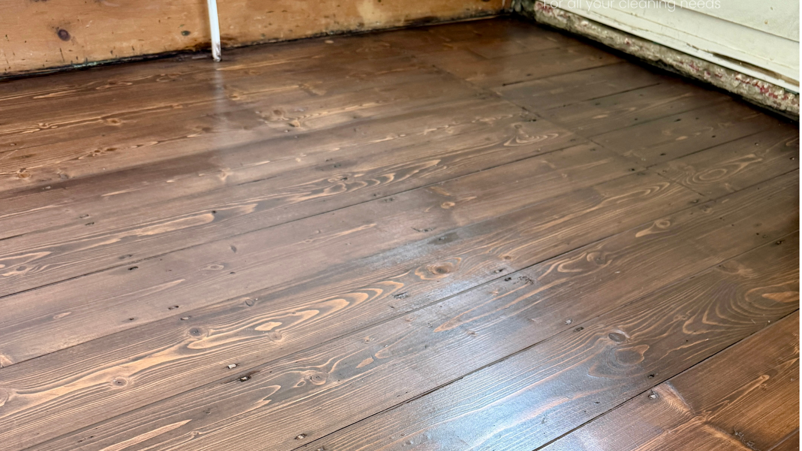 Restored pine floorboards stained dark oak and finished with Bona Traffic HD Silk Matt